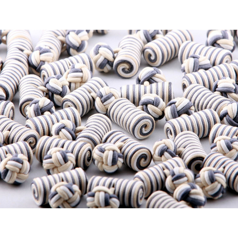 Cylindre beige, gris et blanc